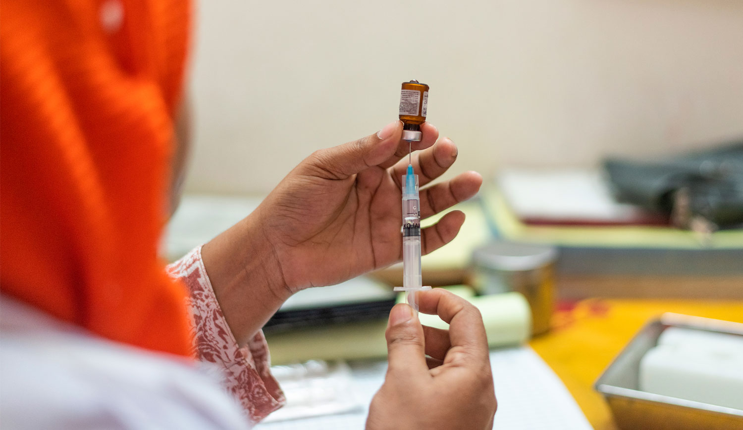 Vaccine being prepared for injection